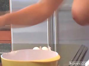 Kelly Madison bares her jugs in the kitchen