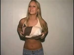 Busty blonde with pierced nipples flashing tits