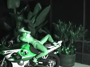 Sexy Vicky Vette stripping on a bike